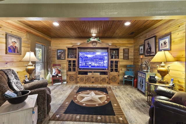 living room with wood ceiling, wooden walls, and hardwood / wood-style flooring