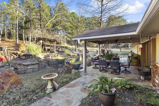 view of patio / terrace featuring ceiling fan