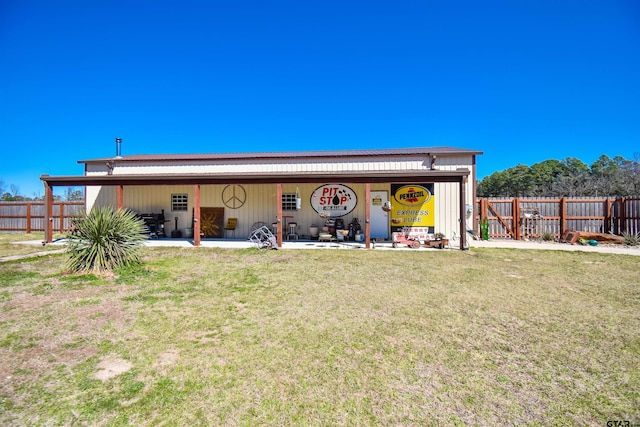 exterior space featuring a yard, a patio area, and a fenced backyard