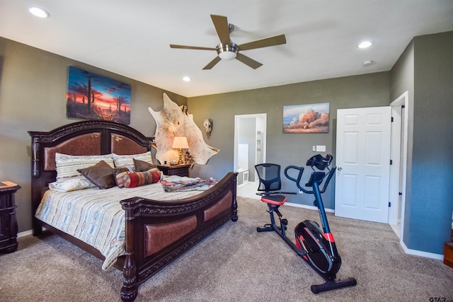 carpeted bedroom with connected bathroom, recessed lighting, ceiling fan, and baseboards