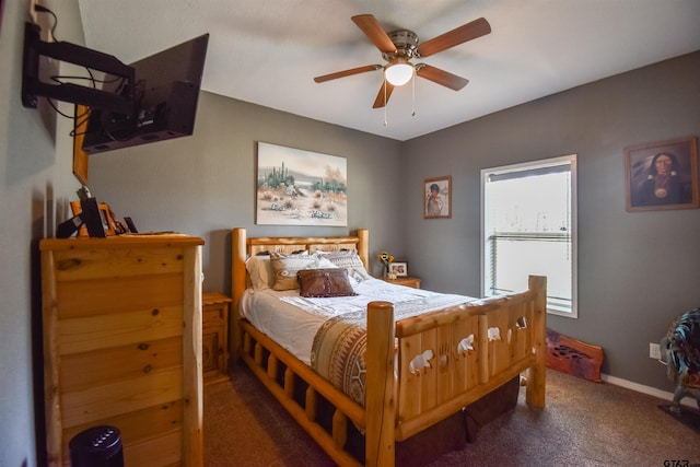 carpeted bedroom featuring ceiling fan and baseboards