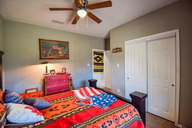 bedroom with a ceiling fan, carpet, a closet, and visible vents