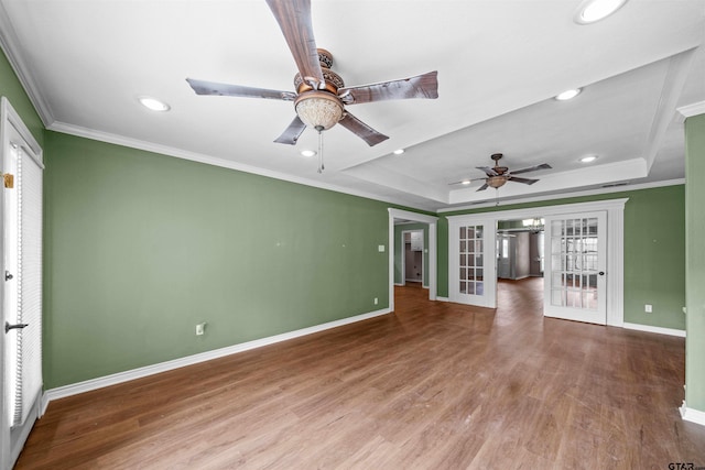 5806 Plantation Dr, Tyler, TX 75703 - unfurnished living room with french doors, baseboards, wood finished floors, ceiling fan, and recessed lighting