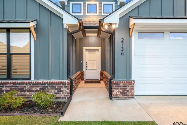 2736 Royal Village Way, Tyler, TX 75701 - doorway to property featuring board and batten siding and an attached garage