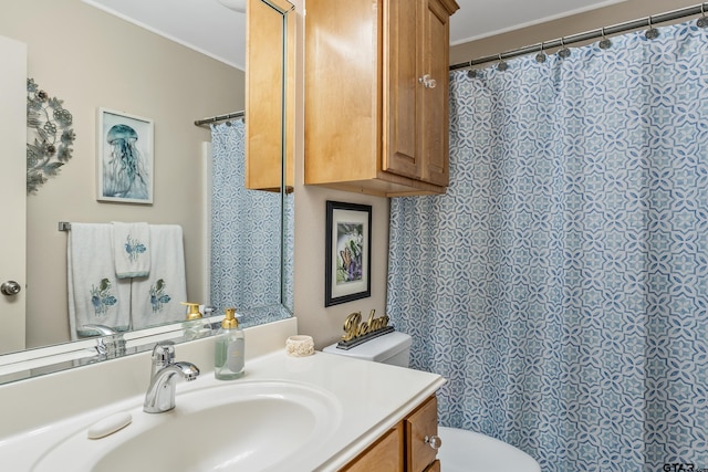9196 Teal Flight Way, Tyler, TX 75703 - full bathroom featuring vanity, toilet, and ornamental molding