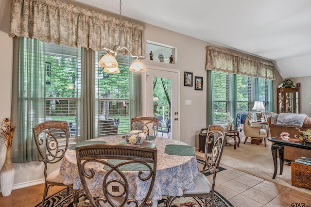 9196 Teal Flight Way, Tyler, TX 75703 - carpeted dining space featuring vaulted ceiling and tile patterned flooring