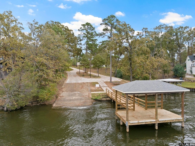 view of dock with a water view