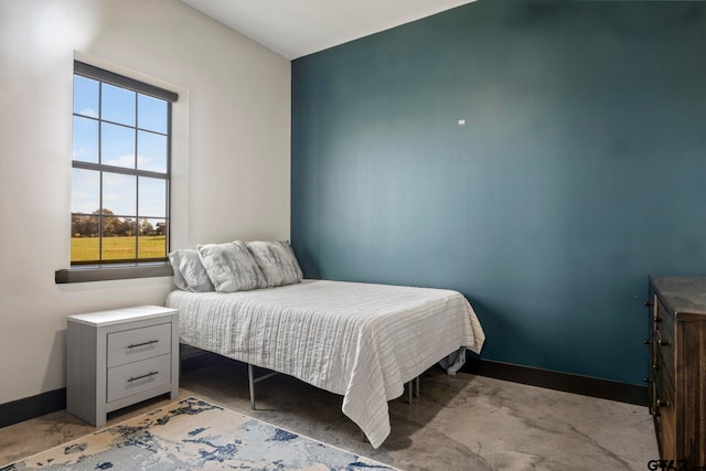 bedroom featuring light colored carpet