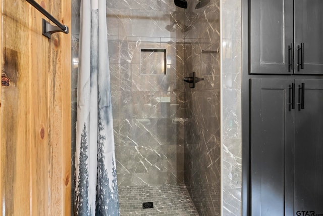 bathroom with a shower with curtain