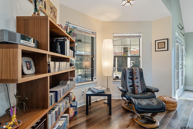 sitting room with dark hardwood / wood-style floors