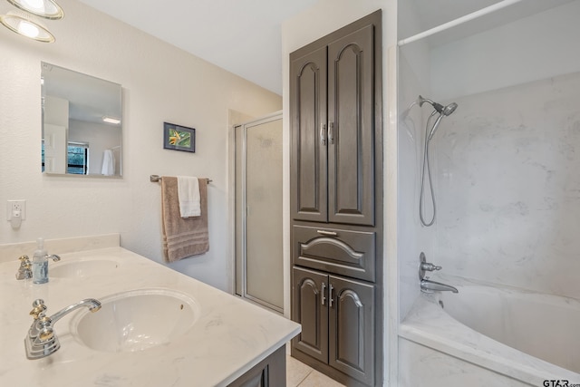 bathroom featuring vanity and tub / shower combination