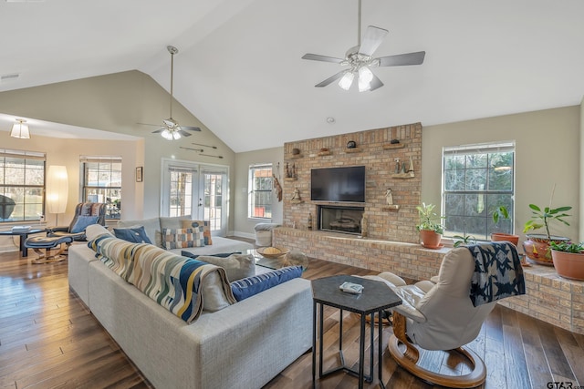 living room with ceiling fan, a healthy amount of sunlight, and dark hardwood / wood-style flooring