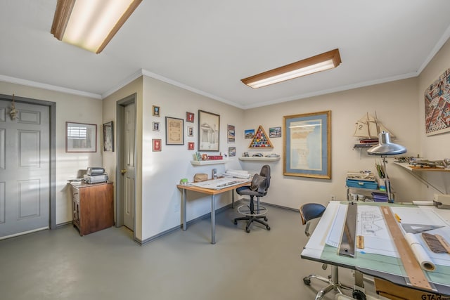 home office with concrete floors and ornamental molding