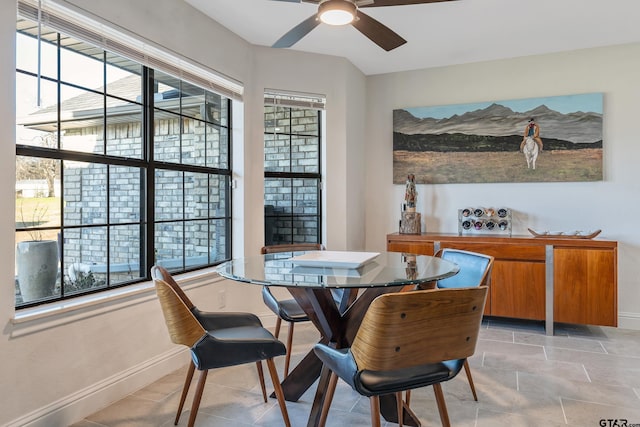 dining room featuring ceiling fan