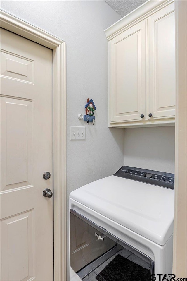 washroom with cabinets