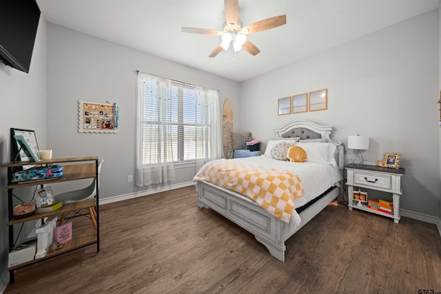 bedroom with dark hardwood / wood-style floors and ceiling fan