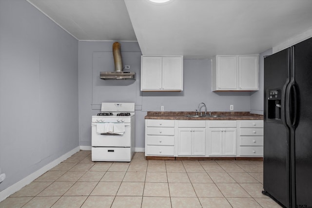 kitchen featuring black refrigerator with ice dispenser, white cabinetry, white range with gas cooktop, wall chimney range hood, and sink