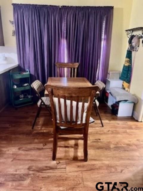 dining area featuring hardwood / wood-style flooring