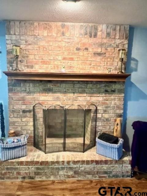 details with a brick fireplace