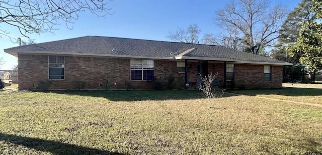 back of house featuring a yard