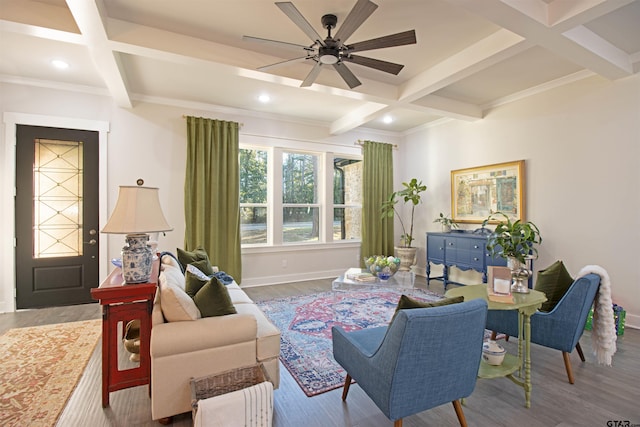 living room with coffered ceiling, ceiling fan, wood-type flooring, and beam ceiling