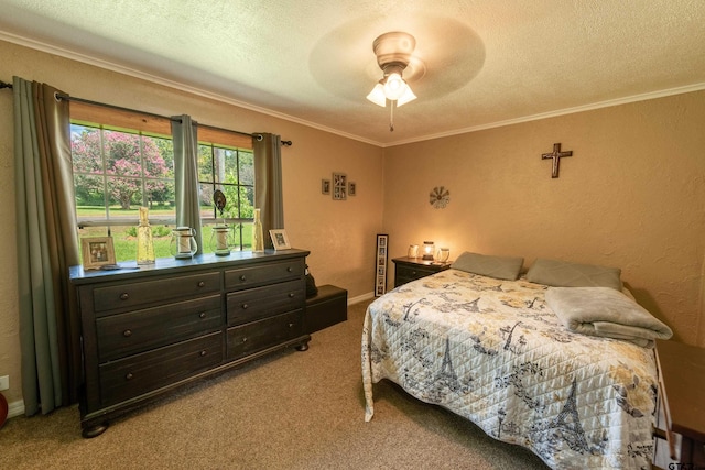 carpeted bedroom with a textured ceiling, ceiling fan, and crown molding