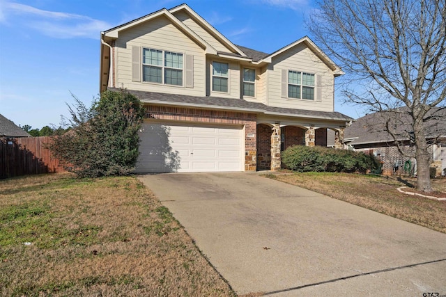 view of front facade featuring a garage and a front lawn