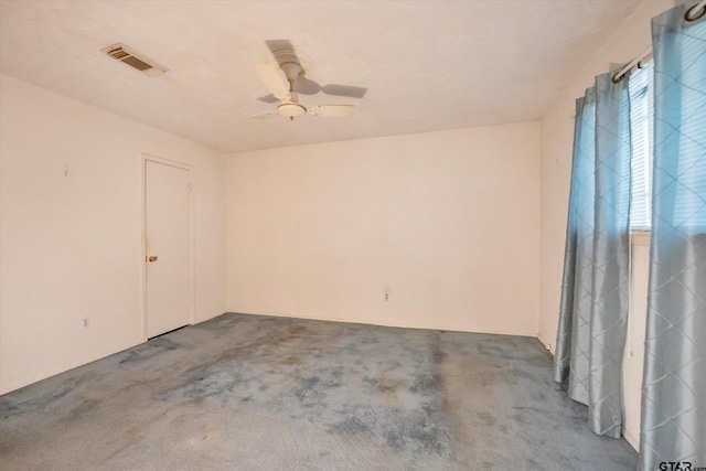 12411 Drifting Winds Dr, Houston, TX 77044 - unfurnished room featuring carpet and a ceiling fan