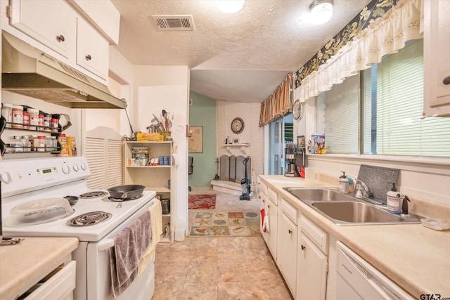 12411 Drifting Winds Dr, Houston, TX 77044 - kitchen featuring white appliances, under cabinet range hood, a sink, light countertops, and a textured ceiling
