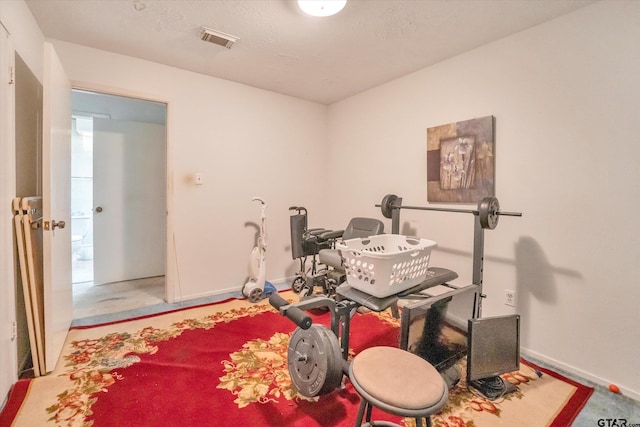 12411 Drifting Winds Dr, Houston, TX 77044 - workout room featuring baseboards and carpet floors
