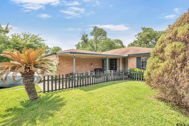 12411 Drifting Winds Dr, Houston, TX 77044 - single story home featuring brick siding