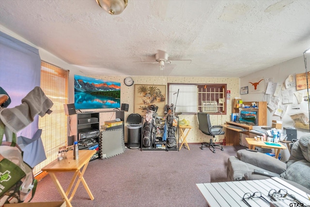 12411 Drifting Winds Dr, Houston, TX 77044 - living room featuring a textured ceiling, carpet floors, and a ceiling fan