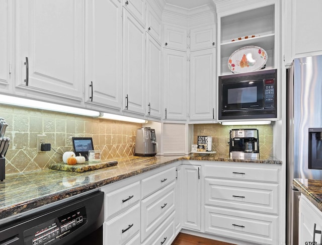 kitchen featuring black appliances, white cabinetry, and dark stone counters