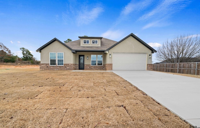 view of front of property with a garage