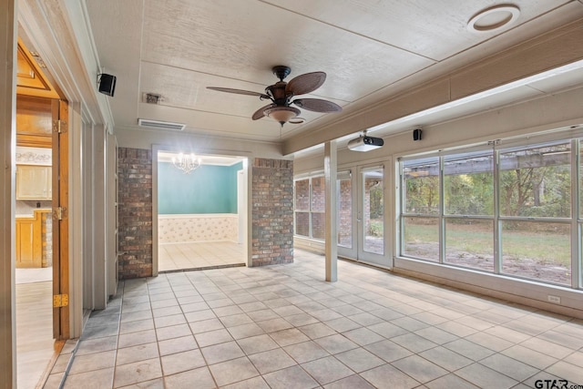 interior space with ceiling fan