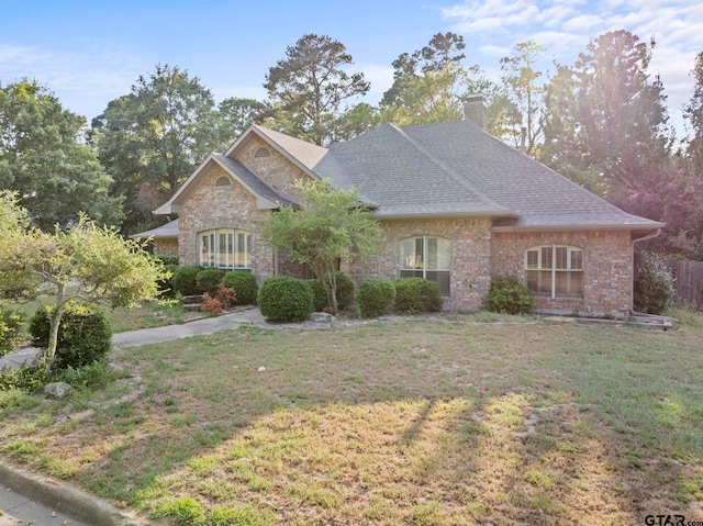 view of front of home with a front lawn