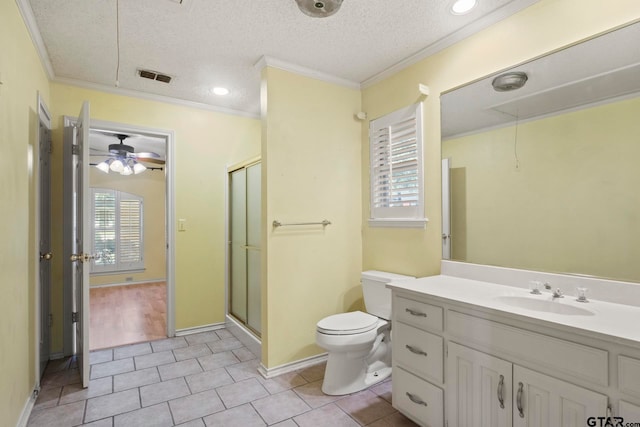 bathroom with tile patterned floors, a wealth of natural light, a shower with door, and crown molding