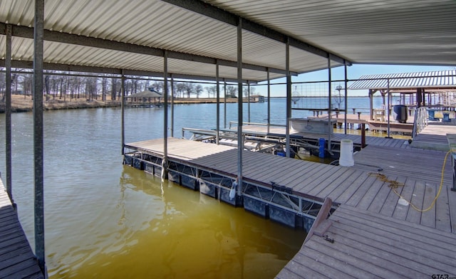 dock area featuring a water view