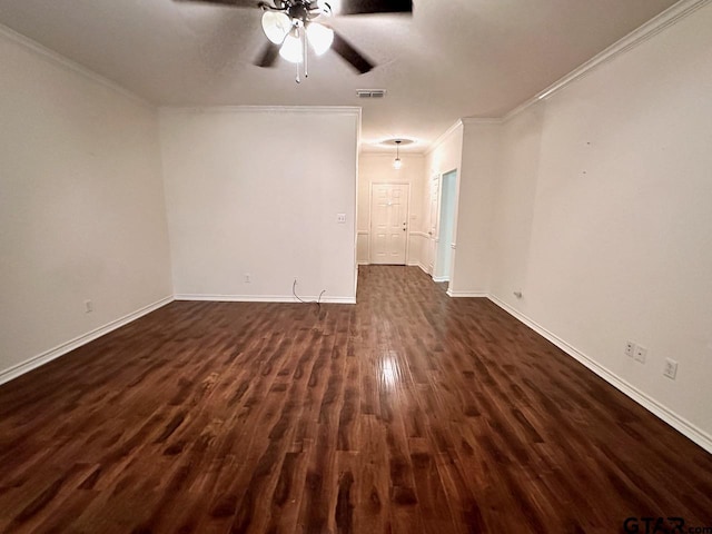 1521 Rice Rd Unit Z103, Tyler, TX 75703 - spare room featuring ceiling fan, crown molding, dark wood-style flooring, and baseboards