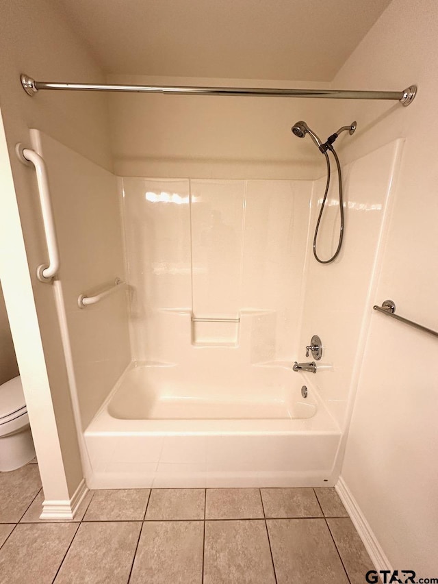 1521 Rice Rd Unit Z103, Tyler, TX 75703 - bathroom with tile patterned floors, toilet, and baseboards