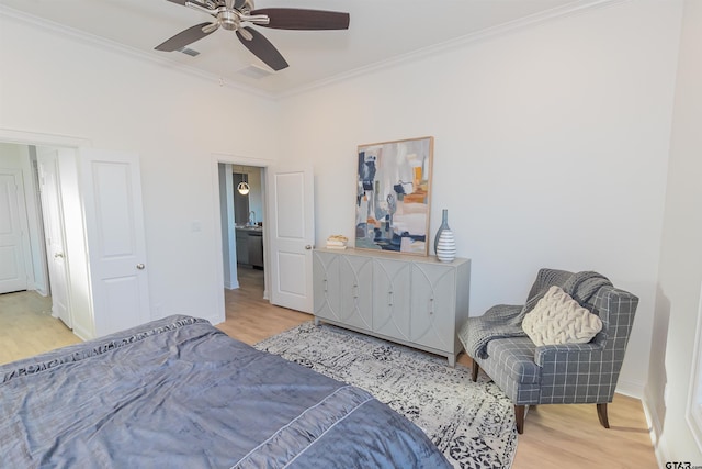 bedroom with light hardwood / wood-style floors, ceiling fan, sink, and crown molding