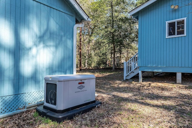 exterior space featuring a power unit and a wood stove