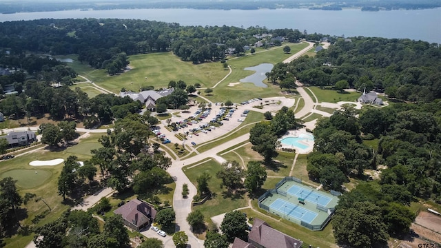 bird's eye view with a water view and view of golf course