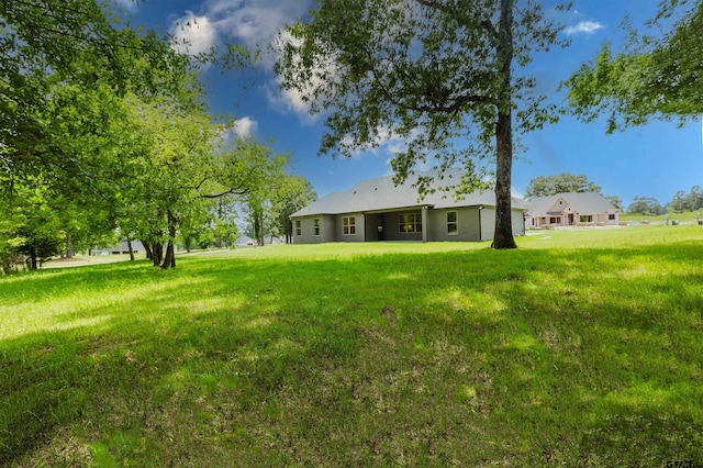 exterior space with a yard