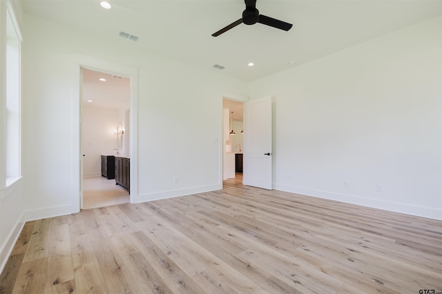 unfurnished bedroom featuring recessed lighting, baseboards, visible vents, and light wood-style floors