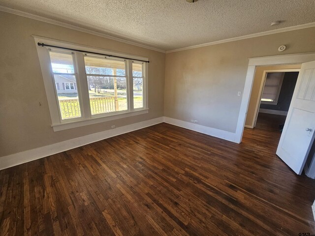 205 E Emma St, Bullard, TX 75757 - spare room with dark wood-style floors, baseboards, a textured ceiling, ornamental molding, and a smoke detector