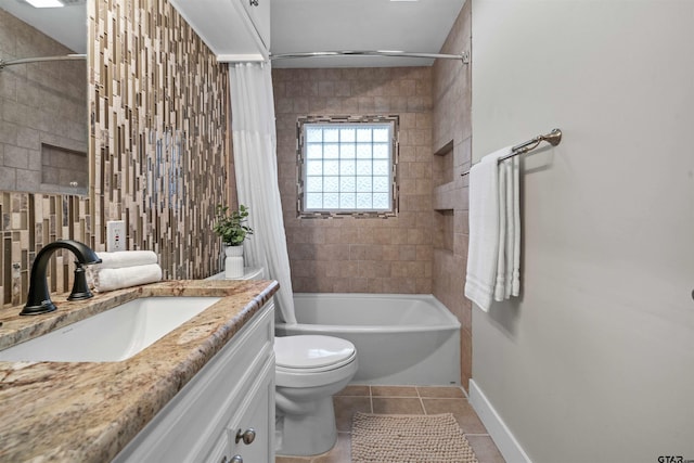 full bathroom featuring tile patterned floors, vanity, shower / bath combo, and toilet