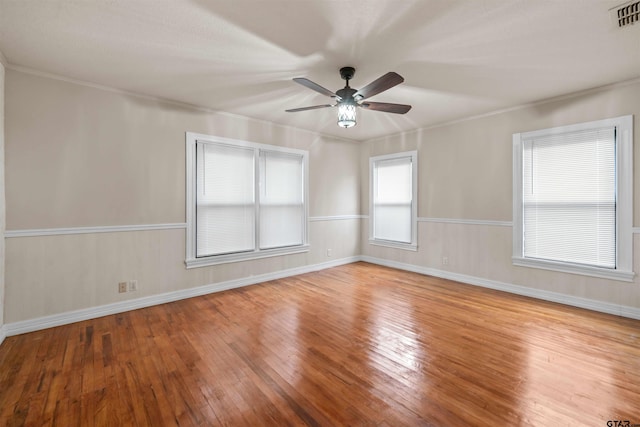 unfurnished room featuring ceiling fan and light hardwood / wood-style floors