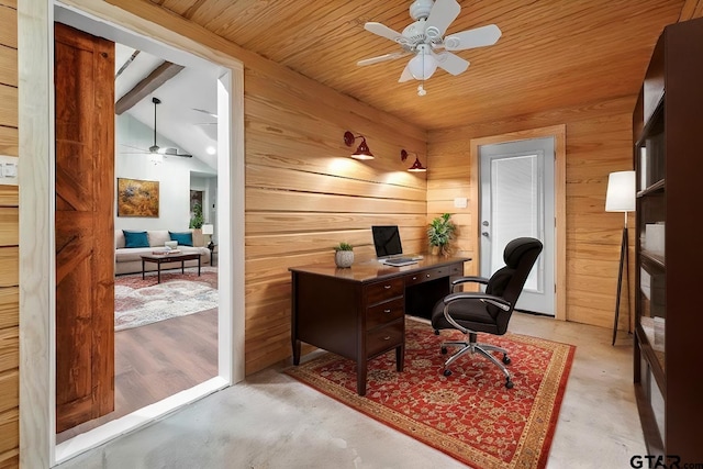 office space with vaulted ceiling with beams, ceiling fan, and wood walls