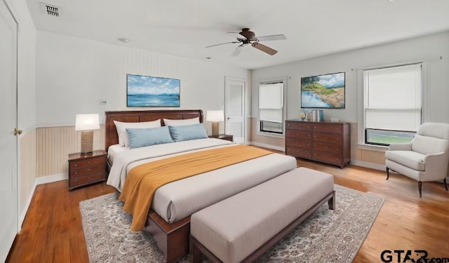 bedroom featuring wood-type flooring and ceiling fan